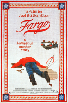 A man lies face down in snow in a pool of blood, presumably his own. A upside down vehicle can be seen in the distance. Above the man, the words "Fargo" and "a homespun murder story" can be seen in red. The image has the appearance of being crafted by cross-stitch.
