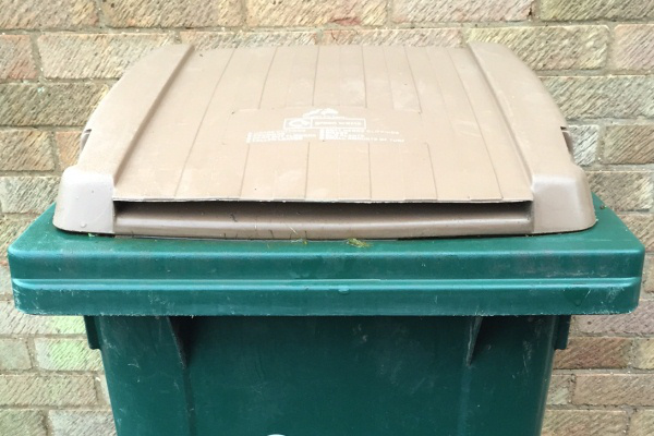 Brown lidded bin