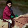 Prince William practiced horse riding near Sandringham Estate in January 1990.