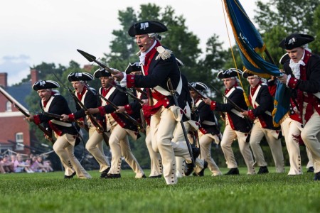 Soldiers assigned to the Military District of Washington&#39;s ceremonial units perform during a Twilight Tattoo at Joint Base Myer-Henderson Hall, Va., May 22, 2024. The event celebrated the strength, traditions and history of the Army through...