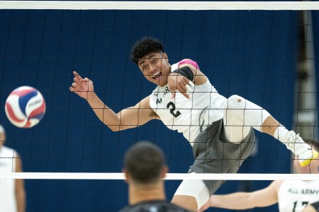 Spc. Asaleti Telea, a right side hitter on the All-Army men&#39;s volleyball team, unleashes a spike against the All-Air Force team, during Army&#39;s 3-1 victory on Sept. 12 at Fort Carson, Co. With the win, Army clinched the 2024 Armed Forces...