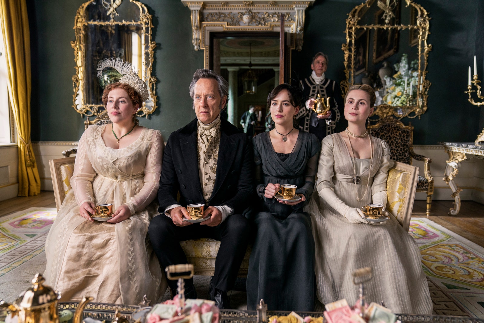 Image may contain Richard E. Grant Human Person Dakota Johnson Lydia Rose Bewley People Food and Meal