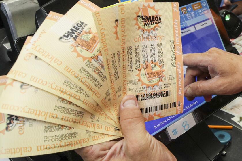 Mega Millions lottery tickets sold at Bluebird Liquor in Hawthorne.