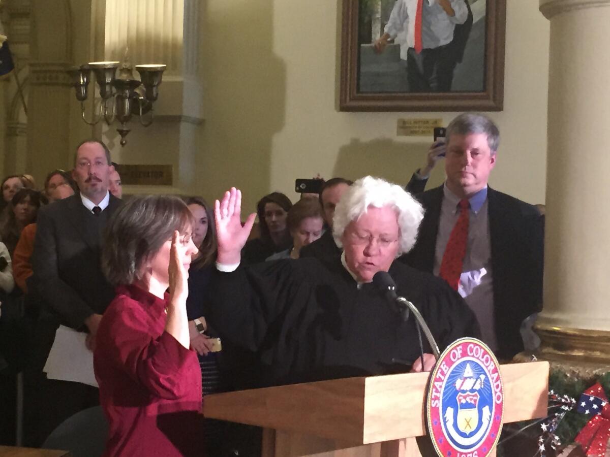 A new elector is sworn in in Colorado after one refused to vote for Hillary Clinton.