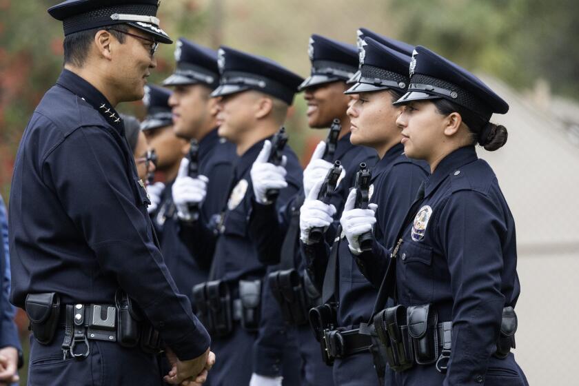 LOS ANGELES, CA - MAY 03: Interim LAPD police chief Dominic Choi meets with recruit class 11-23 during the graduation ceremony at the Los Angeles Police Academy in Los Angeles, CA on Friday, May 3, 2024. (Myung J. Chun / Los Angeles Times)