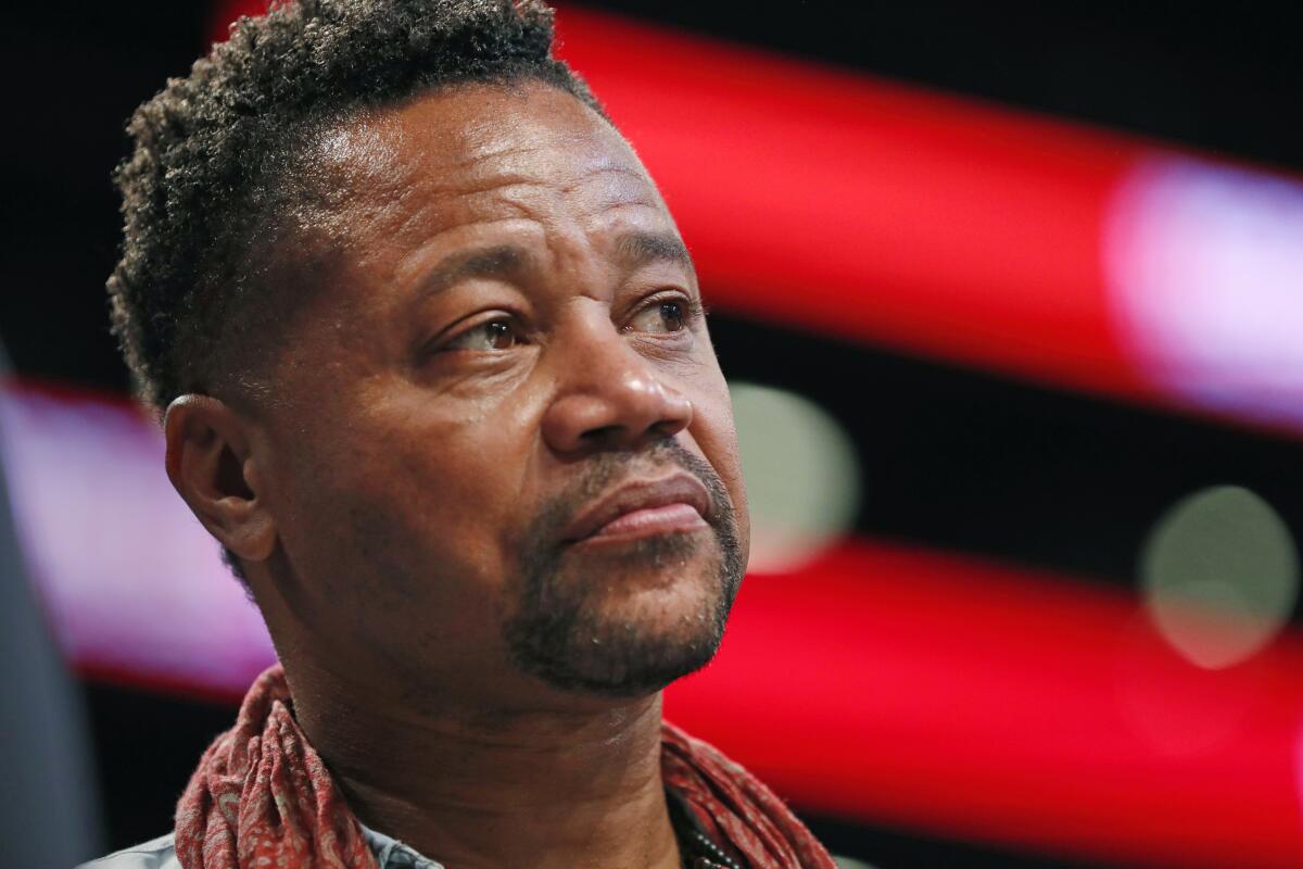 Actor Cuba Gooding Jr. frowns while looking slightly upward