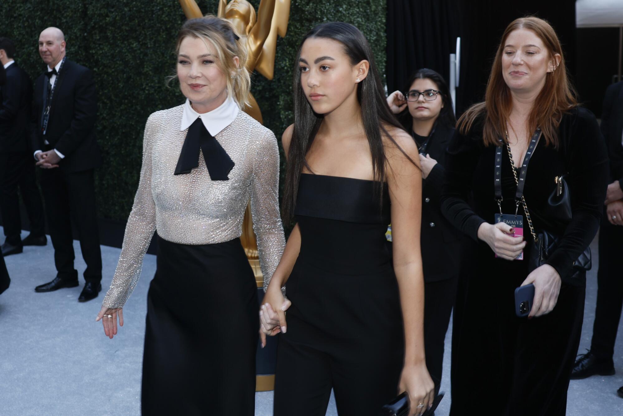 Ellen Pompeo and daughter Sienna arrive at the Emmy Awards.