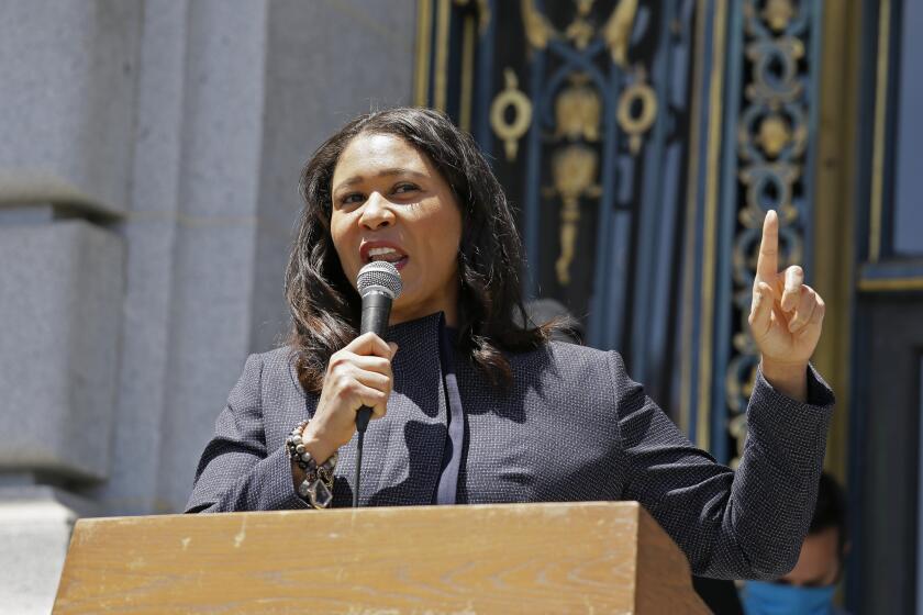 In this June 1, 2020 photo, San Francisco Mayor London Breed speaks to a group protesting police racism.