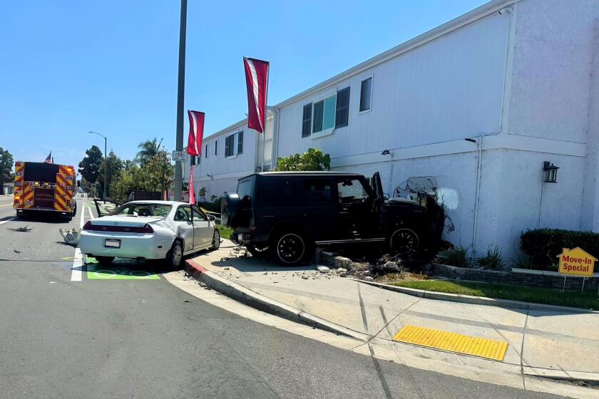 Two drivers were hospitalized Saturday after a crash at the intersection of Costa Mesa's Placentia Avenue and Center Street.
