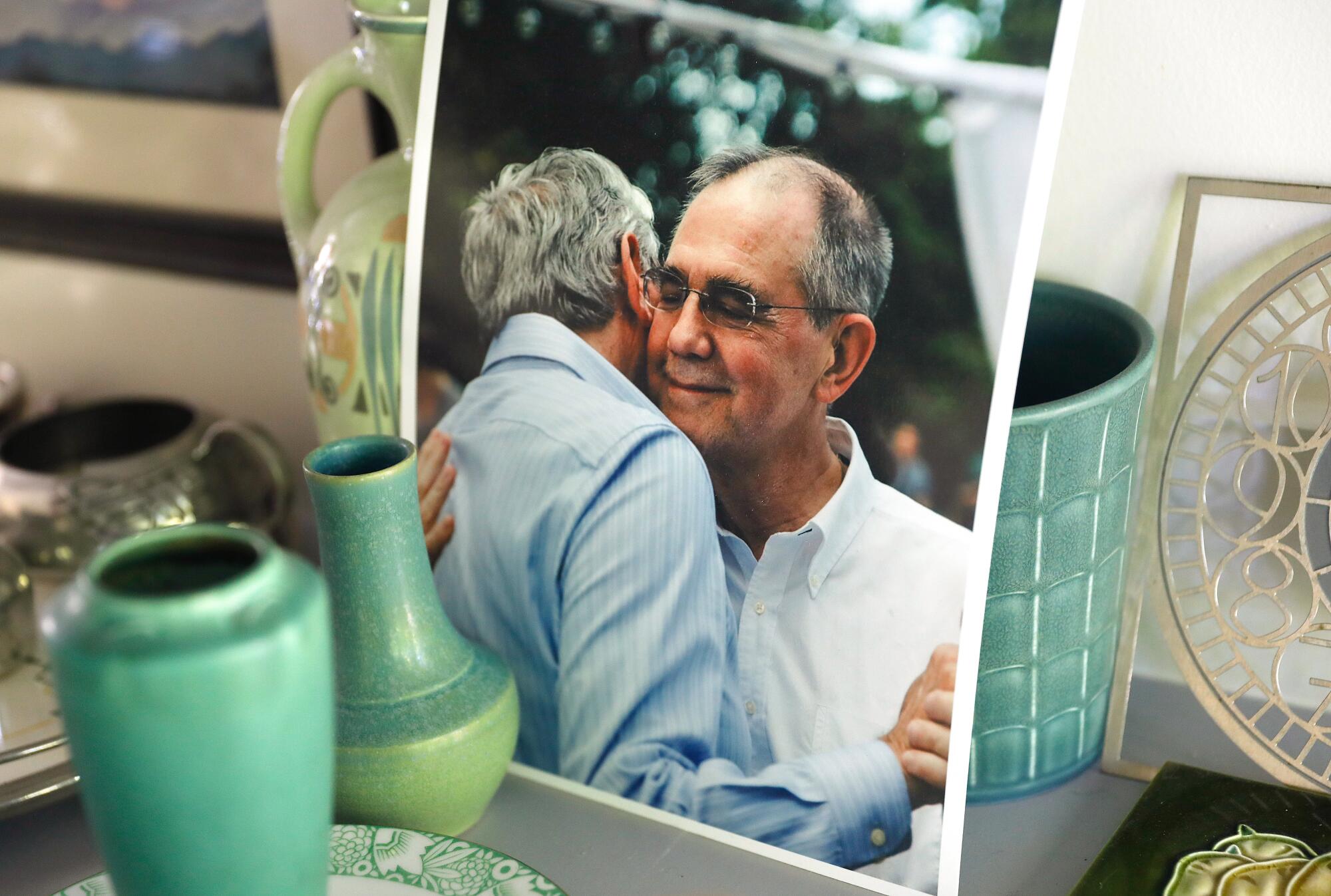 A photograph of Larry Kreisman and his late husband Wayne Dodge, right, inside their home.