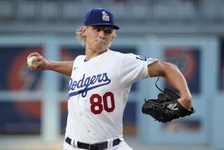 Los Angeles Dodgers starting pitcher Emmet Sheehan throws to the plate during the first inning.