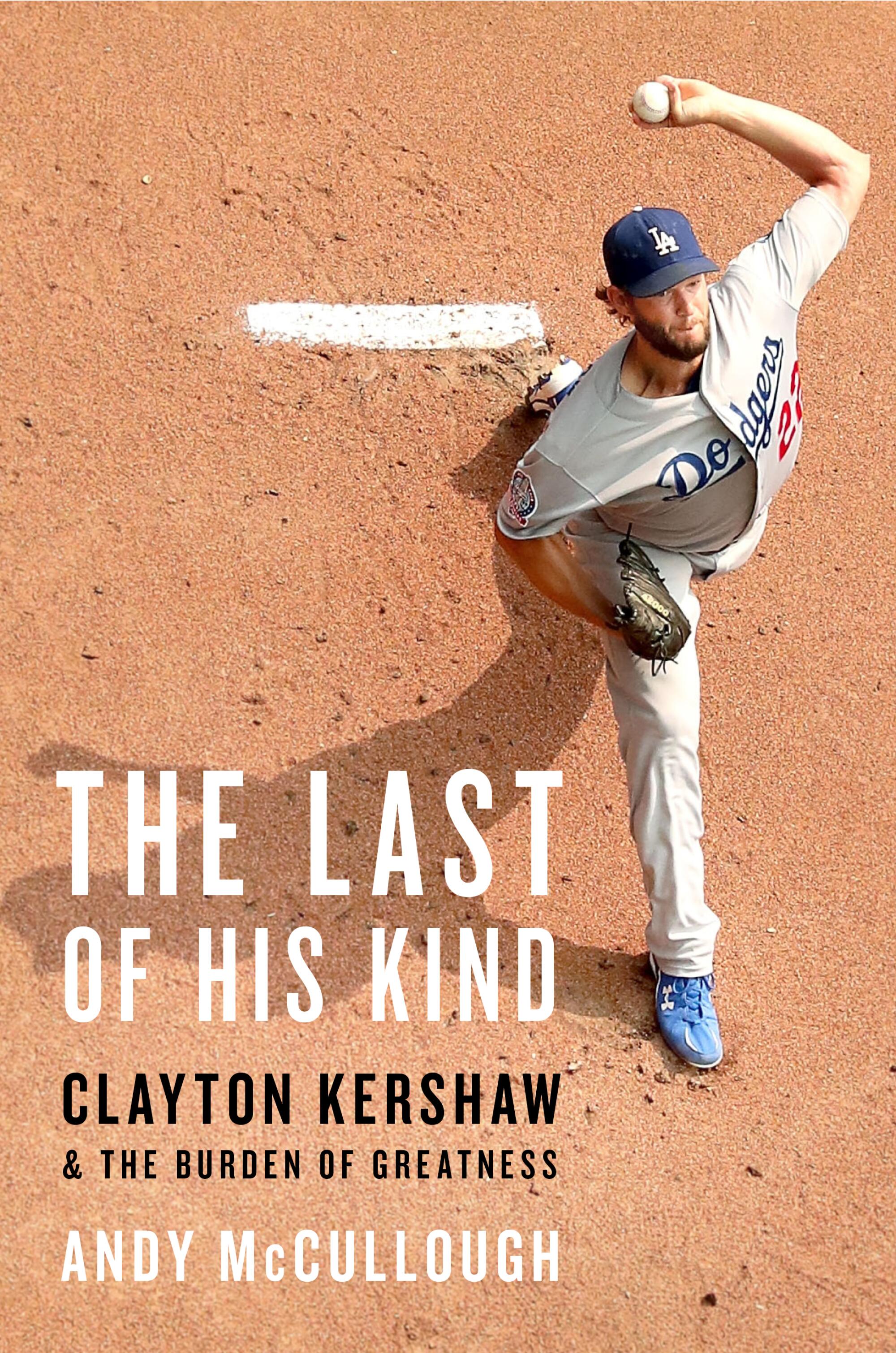 Clayton Kershaw throws a pitch from the mound in a photo featured on the cover the book "Last of His Kind."