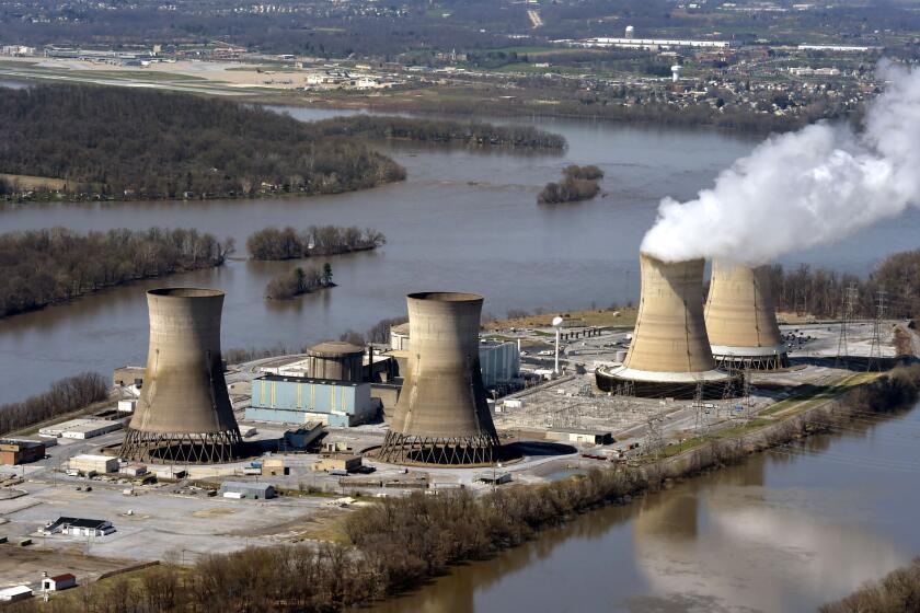 File-This April 18, 2018, file photo shows an aerial view of Three Mile Island, in Dauphin County, Pa. (Richard Hertzler/LNP/LancasterOnline via AP)