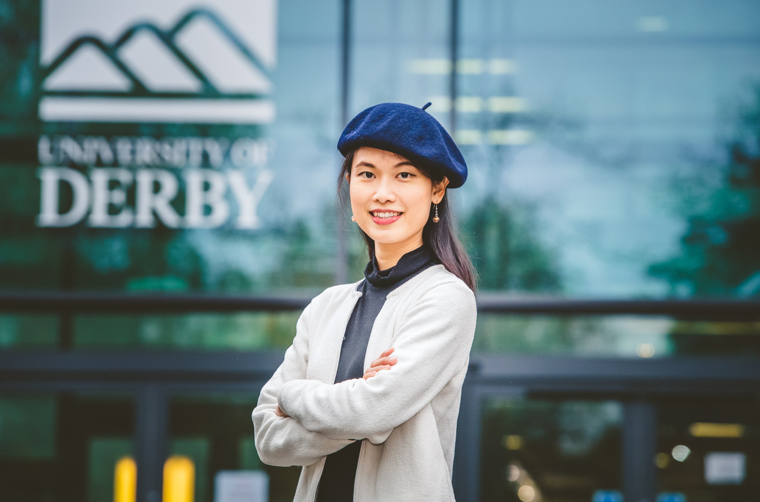 Female international student stood outside of University