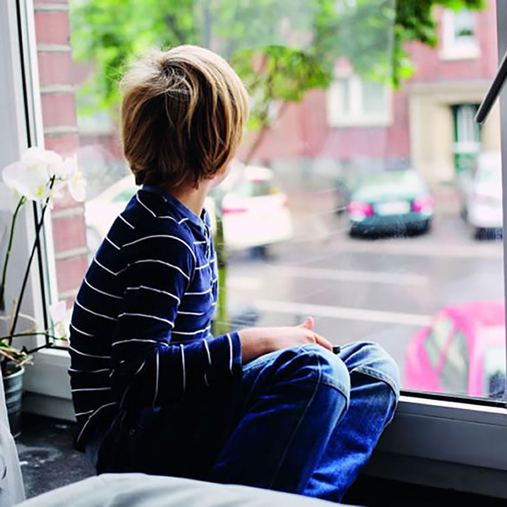 A child looking out of a window