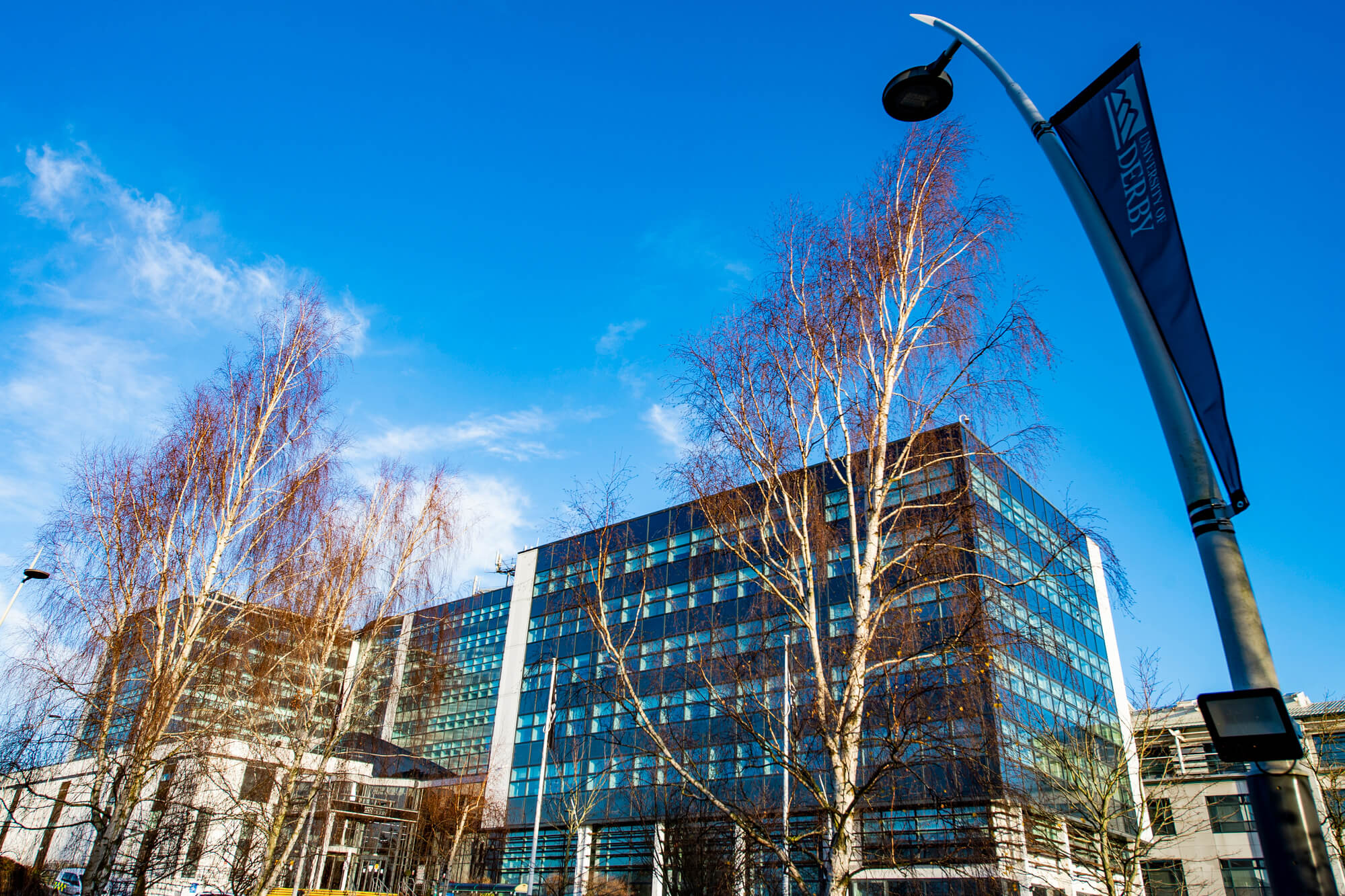 Entrance view of Kedleston Road campus in the daytime. 