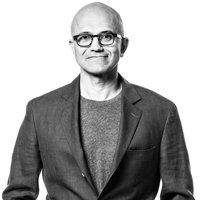 Black and white photograph of Satya Nadella, Chief Executive Officer of Microsoft.