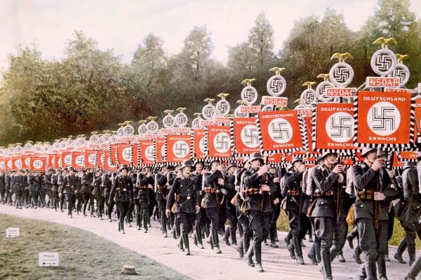 Nazi Germany, Nazi SS troops marching with victory standards at the Party Day rally in Nuremberg, Germany, 1933. (Schutzstaffel, Nazi Party, Nurnberg)