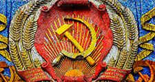 Communism - mosaic hammer and sickle with star on the Pavilion of Ukraine at the All Russia Exhibition Centre (also known as VDNKh) in Moscow. Communist symbol of the former Soviet Union. USSR