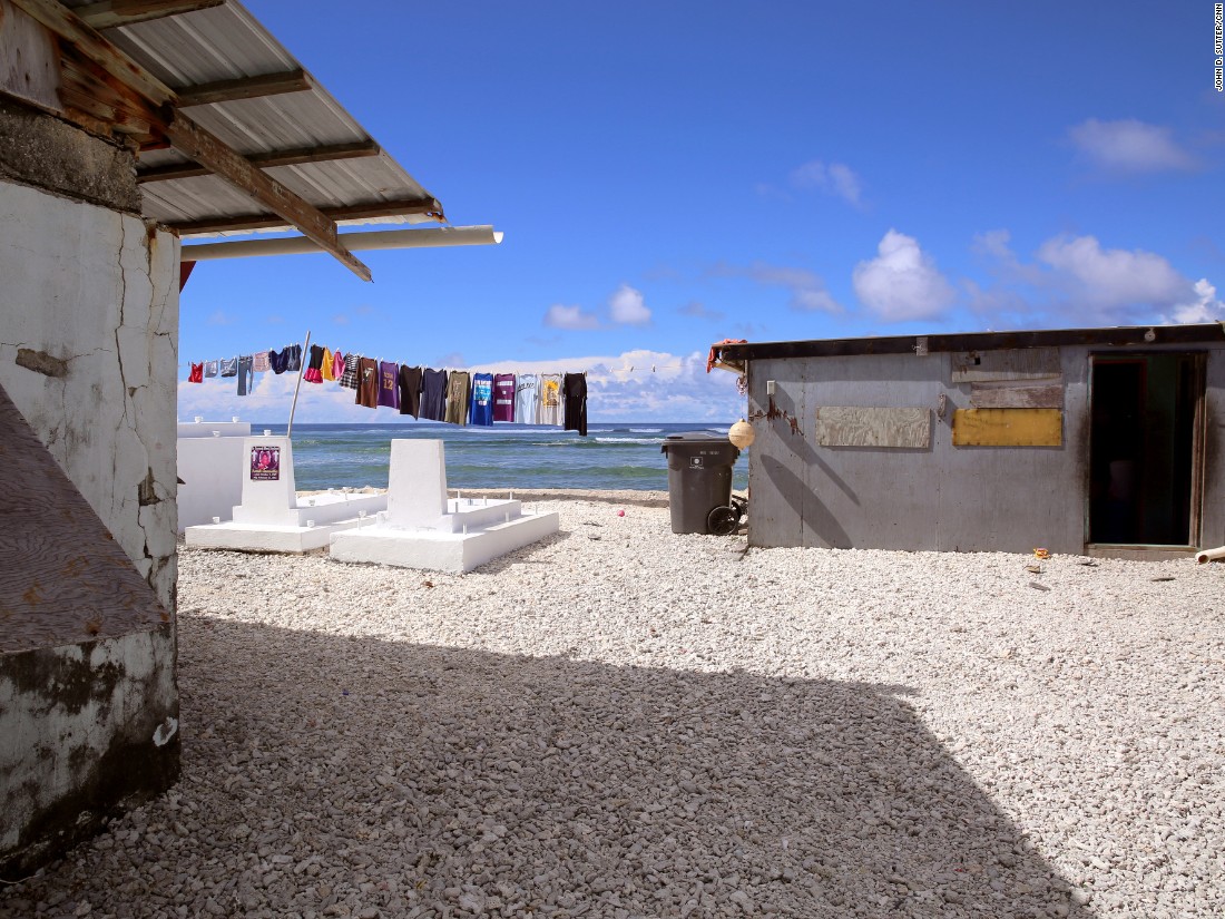 Waves crashed over this home in Majuro during a recent flood, according to residents. Some say they want to leave this precarious spot but don't have the money to do so.