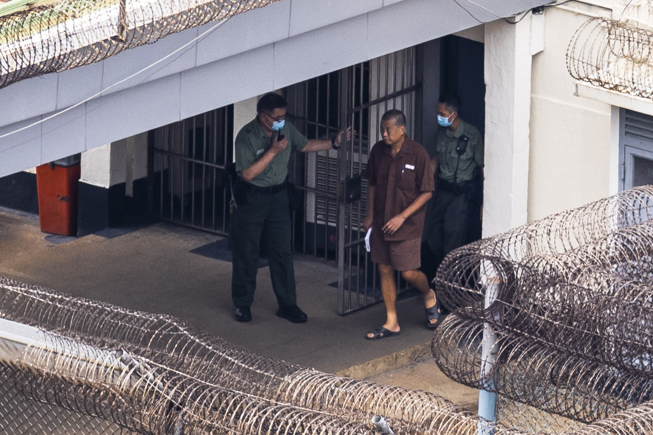 Publishing tycoon Jimmy Lai walks through Stanley Prison on July 28, 2023. Photo: AP 