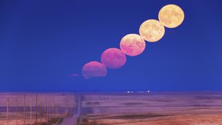 A time lapse of the moon rising over a field