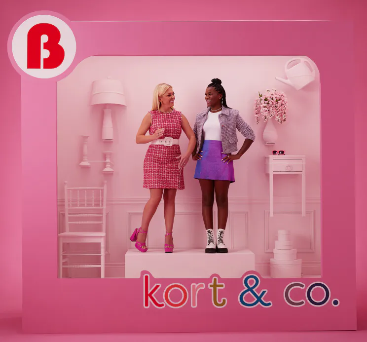 Kort & co. women standing inside of a Barbie box