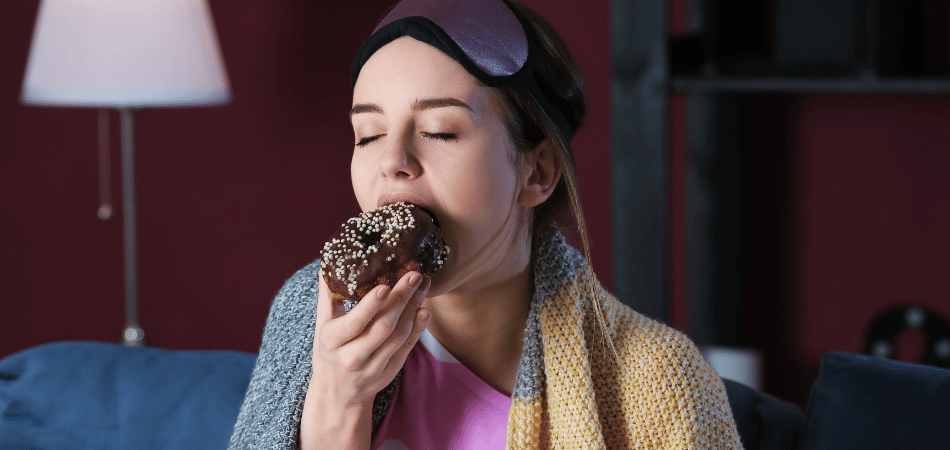 Woman eating at night