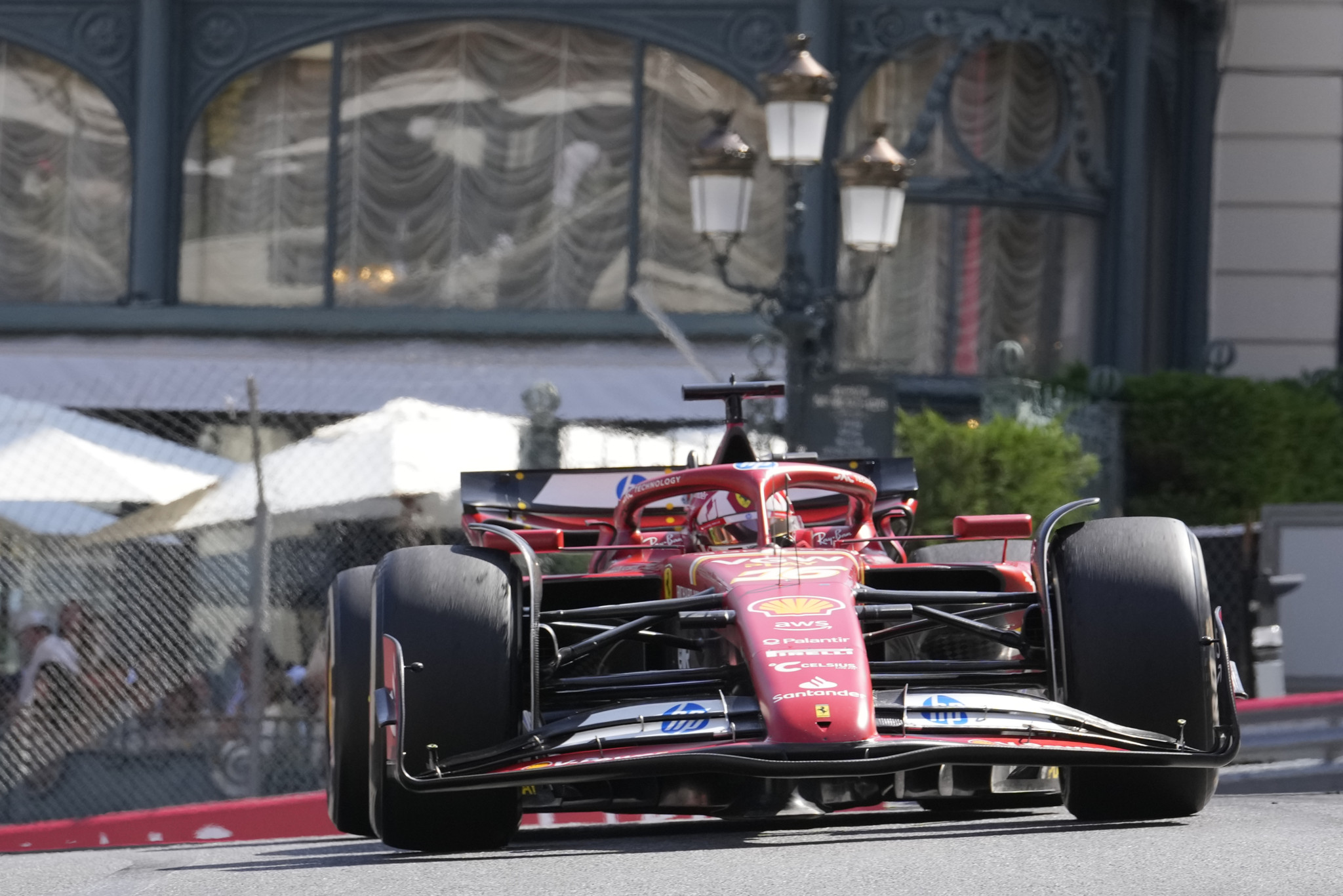 Ferrari driver Charles Leclerc of Monaco steers his car during the Formula One Monaco Grand Prix race at the Monaco racetrack, in Monaco, Sunday, May 26, 2024. (AP Photo/Luca Bruno)