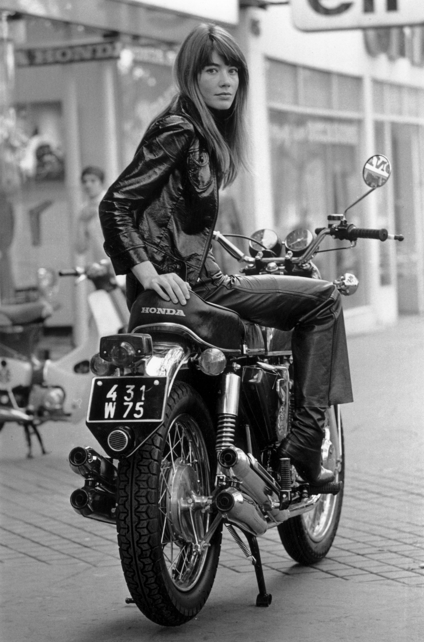 French singer, Francoise Hardy sitting on a Honda CB750 motorcycle, Paris, 25th October 1969. (Photo by Reg Lancaster/Daily Express/Hulton Archive/Getty Images)