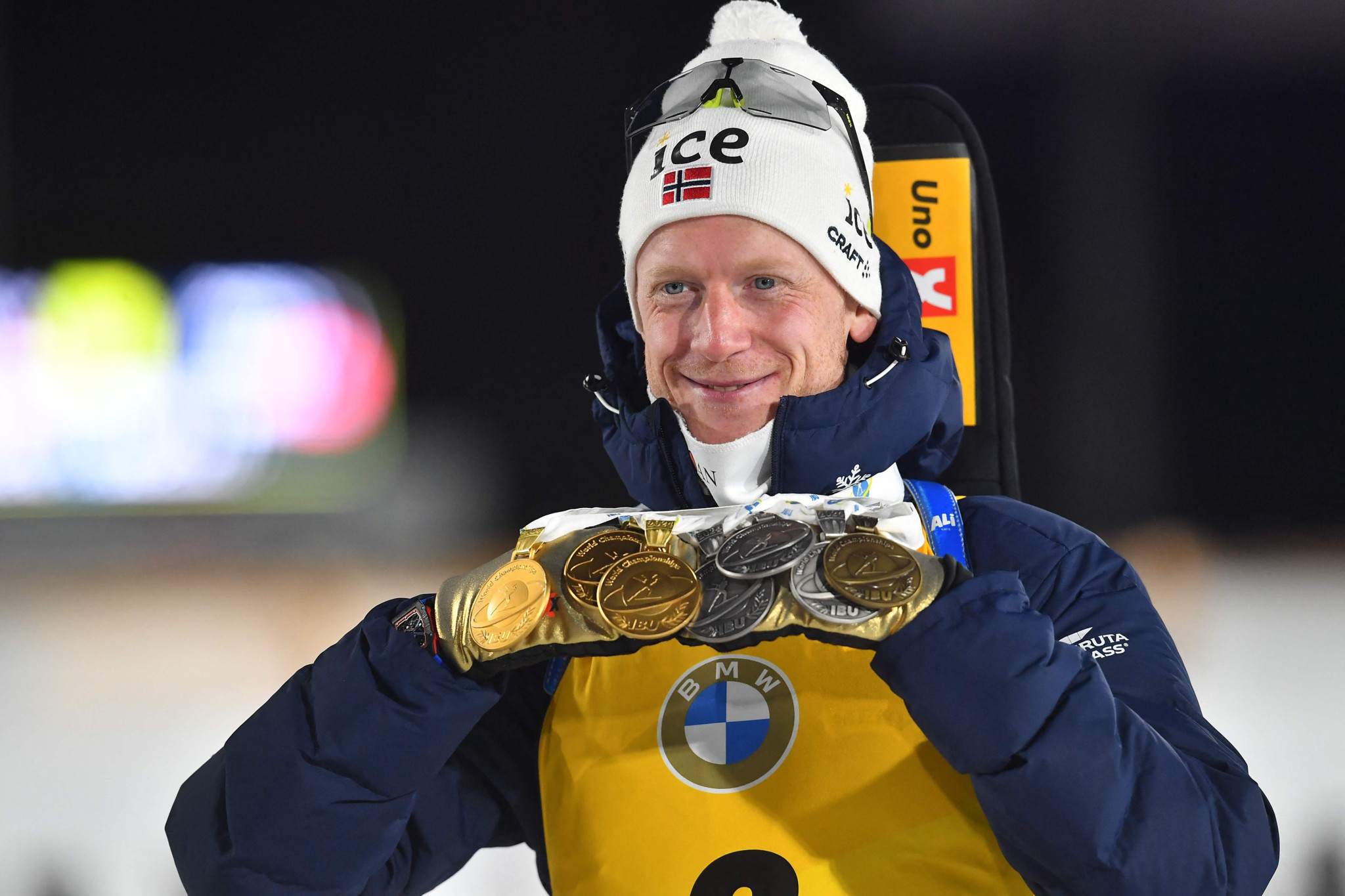 Norway's Johannes Thingnes Bo celebrates with his medals after the men's 15km mass start event of the IBU Biathlon World Championships in Nove Mesto, Czech Republic on February 18, 2024. Norway's Johannes Thingnes Bo won the event ahead of Latvia's Andrejs Rastorgujevs (2nd) and France's Quentin Fillon Maillet (3rd). (Photo by MICHAL CIZEK / AFP)