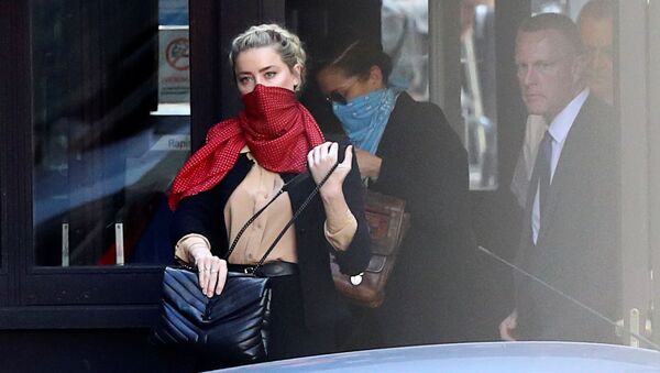 Amber Heard arrives at the High Court in London on 22 July - Sputnik International