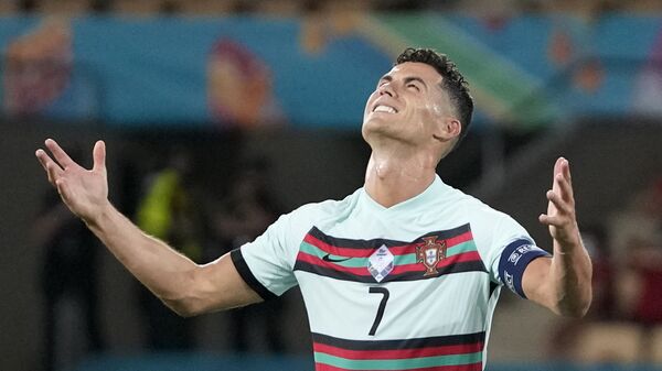 Soccer Football - Euro 2020 - Round of 16 - Belgium v Portugal - La Cartuja Stadium, Seville, Spain - June 27, 2021  Portugal's Cristiano Ronaldo reacts after the match - Sputnik International