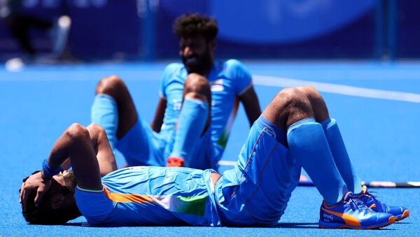 Tokyo 2020 Olympics - Hockey - Men - Semifinal - India v Belgium - Oi Hockey Stadium, Tokyo, Japan - August 3, 2021. Rupinder Pal Singh of India reacts after losing their match. - Sputnik International