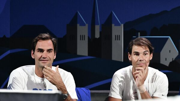 Team Europe's Roger Federer (L) and teammate Rafael Nadal watch a match as part of the 2019 Laver Cup tennis tournament in Geneva, on September 20, 2019 - Sputnik International