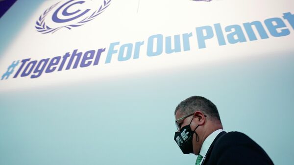 Alok Sharma President of the COP26 summit gets up after a stocktaking plenary session at the COP26 U.N. Climate Summit in Glasgow, Scotland, Saturday, Nov. 13, 2021. Going into overtime, negotiators at U.N. climate talks in Glasgow are still trying to find common ground on phasing out coal, when nations need to update their emission-cutting pledges and, especially, on money. - Sputnik International