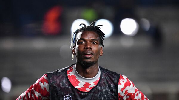 Manchester United's France's midfielder Paul Pogba warms up ahead of the UEFA Champions League group F football match between Atalanta and Manchester United at the Azzurri d'Italia stadium, in Bergamo, on November 2, 2021.  - Sputnik International