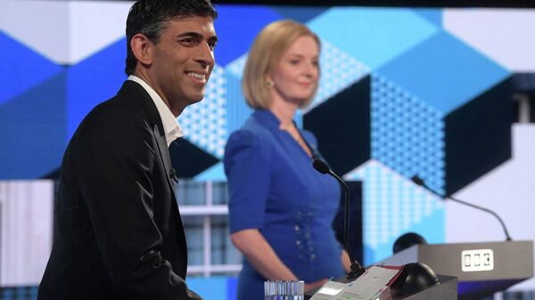 A handout picture released by the BBC, taken and received on July 25, 2022, shows Conservative politicians and candidates to be the the Leader of the Conservative Party, and Britain's next Prime Minister, Rishi Sunak (L) and Liss Truss, as they appear on the BBC's 'The UK's Next Prime Minister - Sputnik International