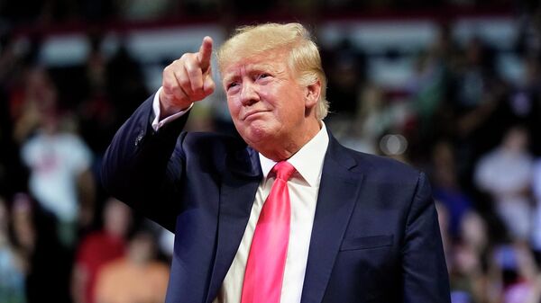 FILE - Former President Donald Trump points to the crowd as he arrives to speak at a rally July 22, 2022, in Prescott, Ariz. - Sputnik International