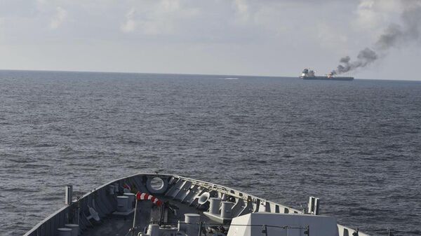 In this photo provided by the Indian Navy on Saturday, Jan. 27, 2024, a view of the oil tanker Marlin Luanda in the background, on fire after an attack, in the Gulf of Aden, taken from the Indian navy guided missile destroyer INS Visakhapatnam - Sputnik International