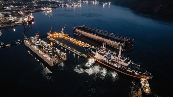 Towing of the nuclear icebreaker Lenin from its mooring place at the Murmansk Marine Station to the PD-3 dock located in the port waters for scheduled repairs. The legendary nuclear icebreaker will be prepared for the anniversary of the nuclear icebreaker fleet, with its hull and wheelhouse painted. In addition, the hull tanks and bottom-side fittings will be inspected. August 13, 2024. - Sputnik International