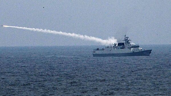 Type 056 corvette 503 firing short range anti-air missile during exercise - Sputnik International