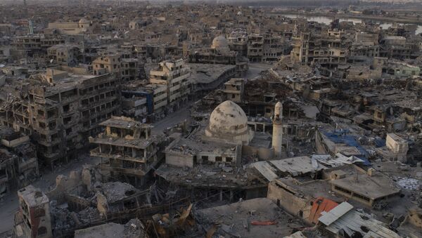 In this Nov. 15, 2017 photo, aerial view of destroyed building and shops in the Old City of Mosul, Iraq - Sputnik International