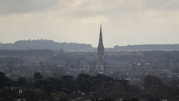 In this Tuesday, March 13, 2018 file photo the combined tower and spire of Salisbury Cathedral stand surrounded by the medieval city where former Russian double agent Sergei Skripal and his daughter were found critically ill following exposure to the Russian-developed nerve agent Novichok in Salisbury, England - Sputnik International