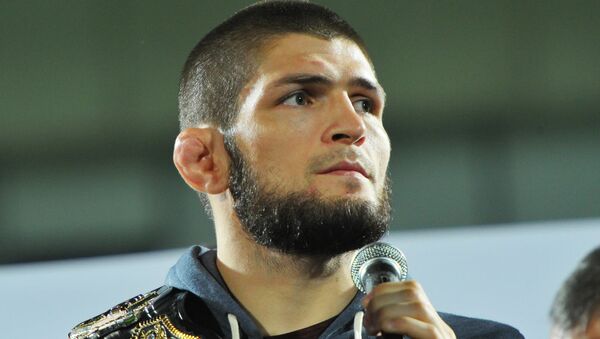 Khabib Nurmagomedov With UFC Champion Belt - Sputnik International