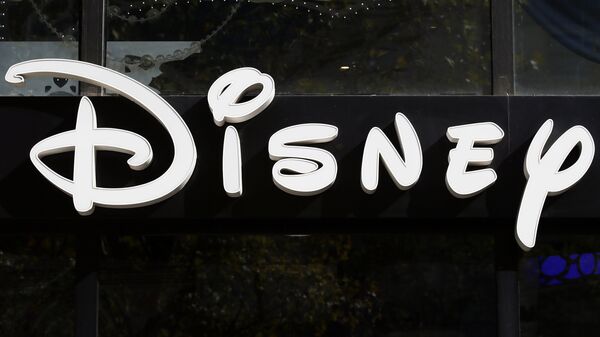 The logo of theme parks Disney Store is pictured on the Champs Elysees Avenue in Paris, France, Wednesday, Sept. 20, 2017. - Sputnik International