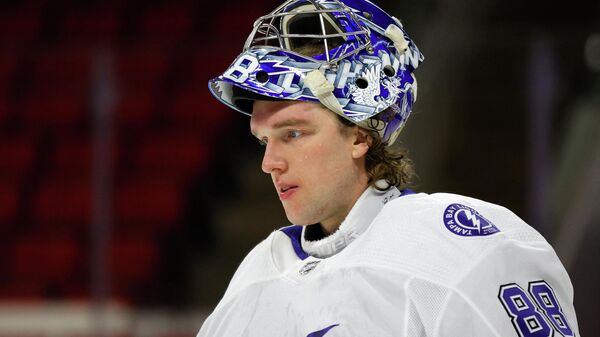 RALEIGH, NORTH CAROLINA - FEBRUARY 22: Andrei Vasilevskiy #88 of the Tampa Bay Lightning looks on during the first period of their game against the Carolina Hurricanes at PNC Arena on February 22, 2021 in Raleigh, North Carolina.   Jared C. Tilton/Getty Images/AFP (Photo by Jared C. Tilton / GETTY IMAGES NORTH AMERICA / Getty Images via AFP)