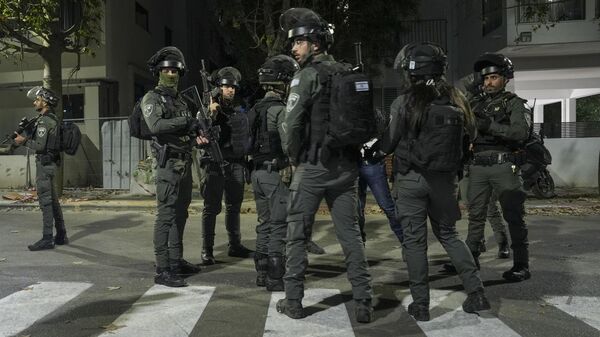 Полицейские на месте стрельбы в Тель-Авиве. 9 марта 2023