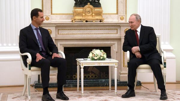 Президент России Владимир Путин и президент Сирии Башар Асад во время встречи