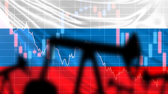 Oil pump jack, chart, and Russian flag